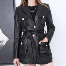 Women's black faux leather belted jacket with gold buttons and front pockets, stylish outerwear for trendy looks.