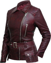 Burgundy women's leather moto jacket with belted waist, zippers, and pockets — stylish, fitted design