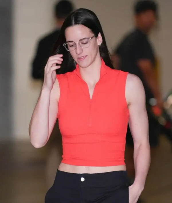 Orange sleeveless Caitlin Clark crop top with half zip closure