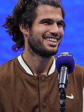 Carlos-Alcaraz-brown-jacket