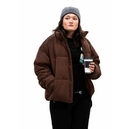 Dr Trinity Santos brown puffer jacket from The Pitt