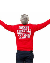 JK red cardigan with Johnny Knoxville back print