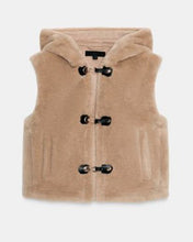Women's brown shearling gilet with toggle button closure