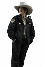 Lanterns-S01-Kelly-Macdonald-Black-Uniform-Jacket